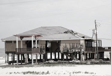 Wind damage - spray foam can help prevent uplift to Albuquerque roofs